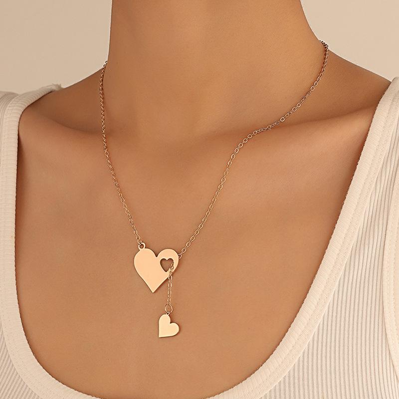 ins simple love pendant necklace female fashion personality creative hollow peach heart clavicle chain Y-shaped necklace