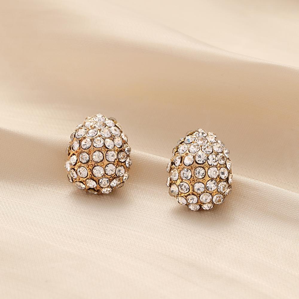 The classic star with the same light luxury popular design metal full diamond crescent moon women's fashion earrings jewelry