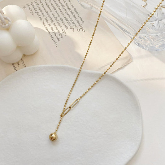 Frosty ins design tassel necklace stitching and pulling small gold ball titanium steel gold-plated clavicle chain