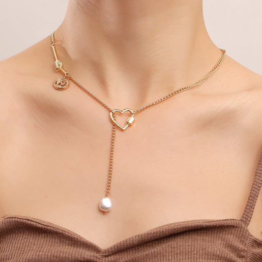 Explosive simple long tassel hollow love pendant necklace female ins niche design sense light luxury