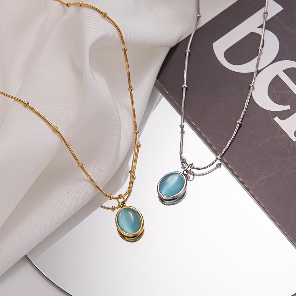 Simple niche light luxury oval titanium steel necklace blue cat's eye pendant clavicle chain temperament design high-end jewelry