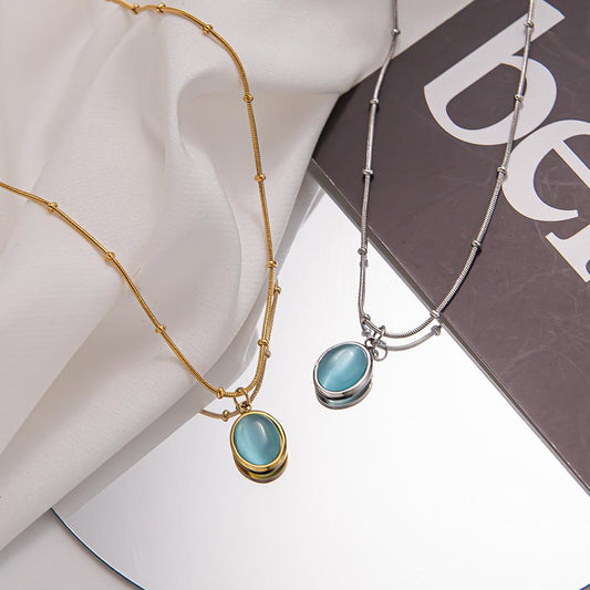 Simple niche light luxury oval titanium steel necklace blue cat's eye pendant clavicle chain temperament design high-end jewelry