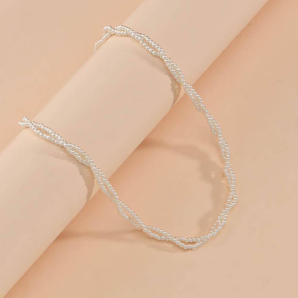 Fashionable millet grain imitation pearl braided twist winding temperament double layer short necklace collarbone necklace