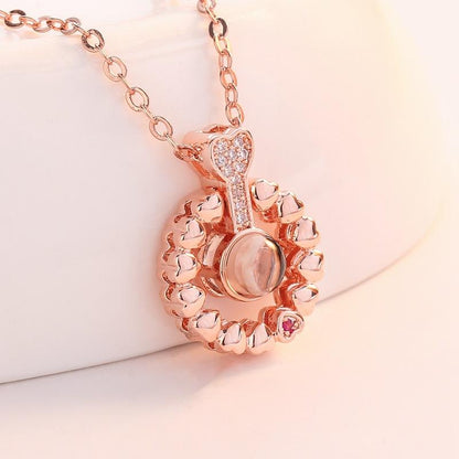 The same round micro-inlaid zircon small love pendant in one hundred languages I love you necklace