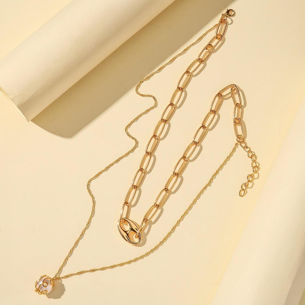 Personalized pig nose collarbone necklace fashion double temperament pearl hollow metal necklace