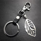 Hollow out leaves titanium steel jewelry accessories cowhide key chain 316 stainless steel men's waist hanging women's bag pendant