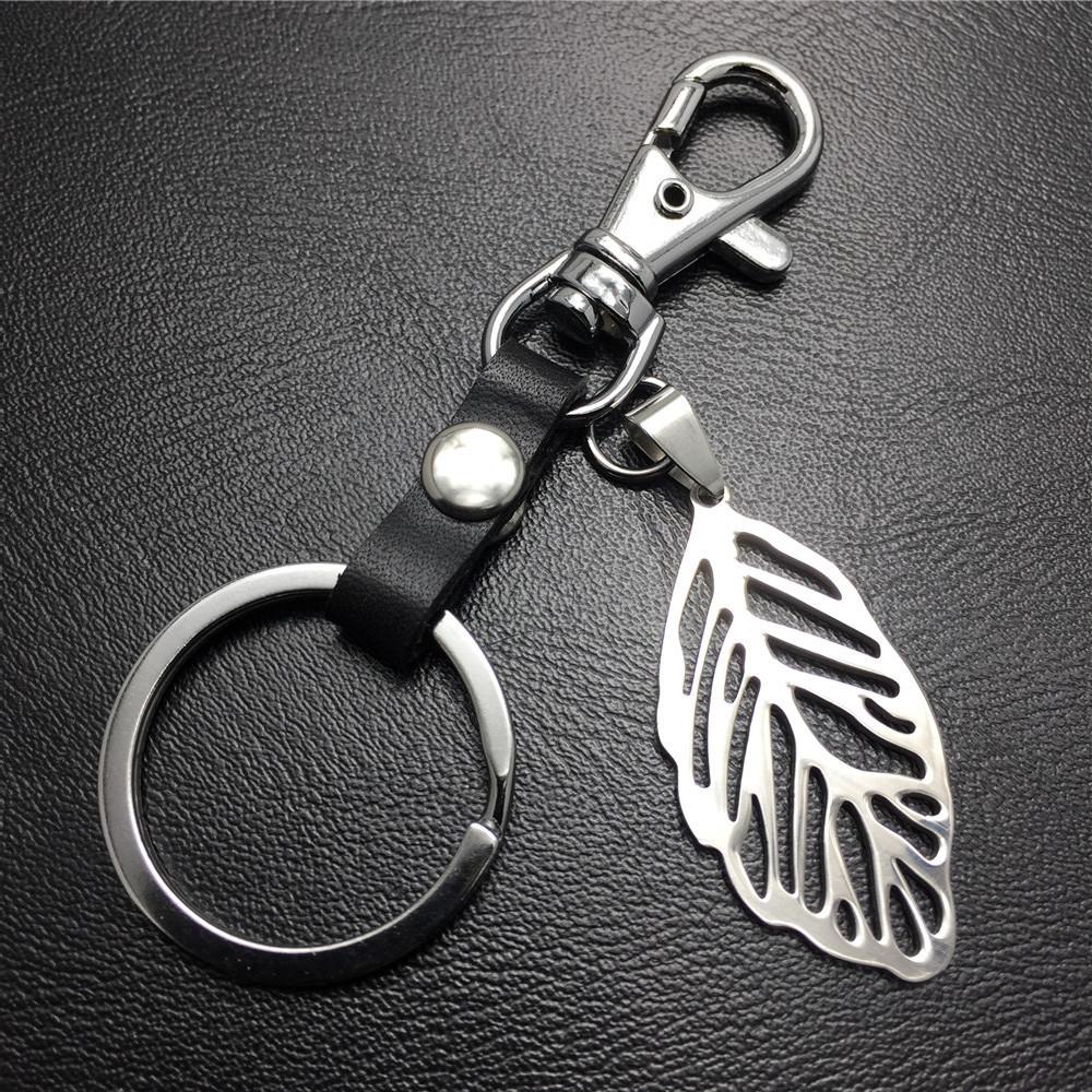 Hollow out leaves titanium steel jewelry accessories cowhide key chain 316 stainless steel men's waist hanging women's bag pendant