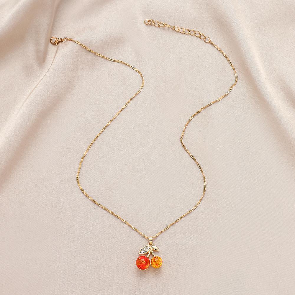 Sweet cool cherry pendant necklace women's trendy sweater chain niche design simple resin ball clavicle chain