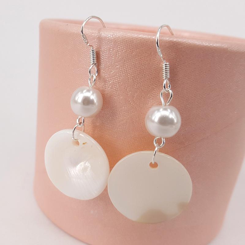 Natural round shell earrings simple pure handmade retro temperament female pearl earrings second hair Aqin same style