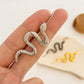 ins creative personality snake-shaped ear hanging ear clip punk exaggerated puncture ear needle simple profile slash ear piercing