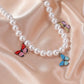 Ins cold temperament pearl necklace fantasy color butterfly clavicle chain simple short ladies necklace