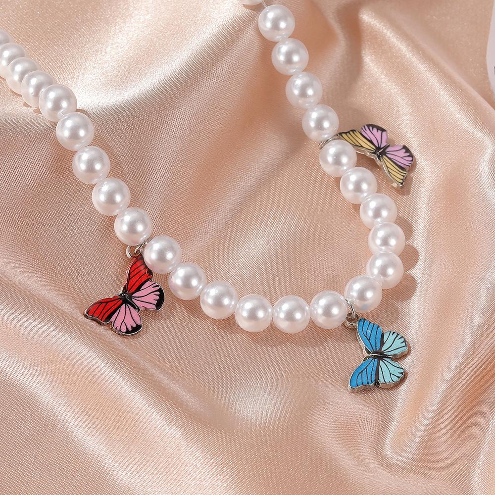 Ins cold temperament pearl necklace fantasy color butterfly clavicle chain simple short ladies necklace