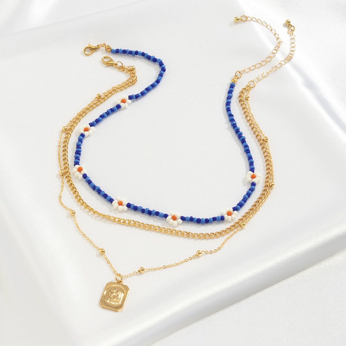 Jewelry fashion small daisy flower rice bead necklace simple metal portrait tag necklace female