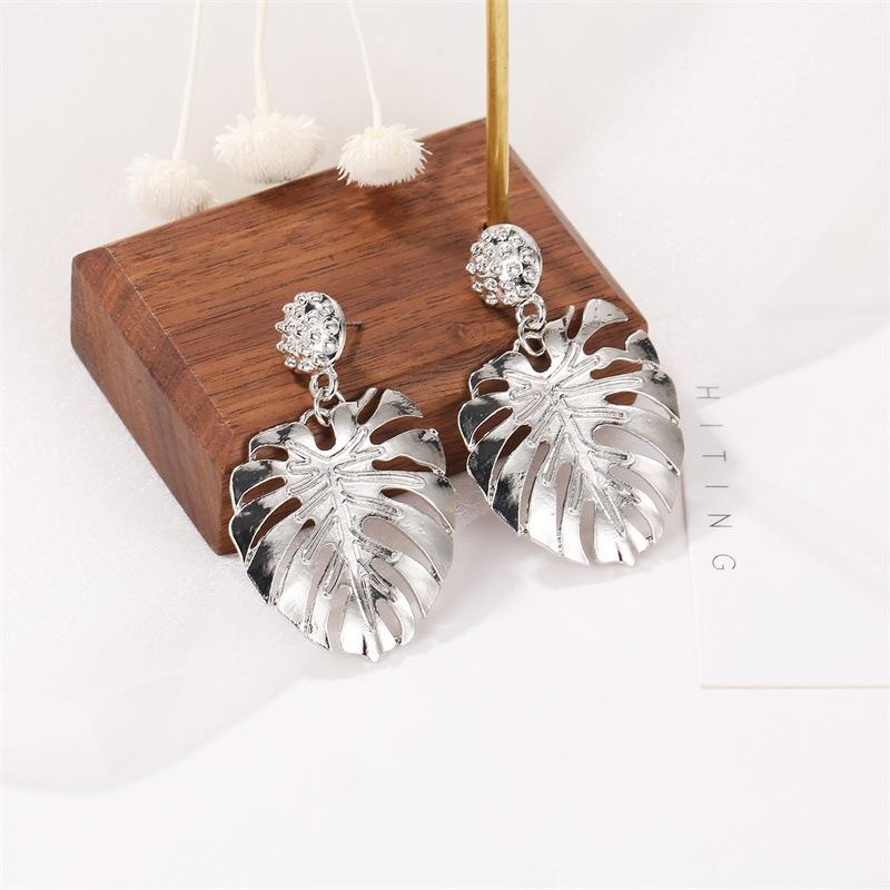 Fashion hollow leaf stud earrings national classic style