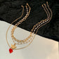 Stacked retro little angel pendant versatile collarbone chain temperament fashion imitation crystal love necklace female