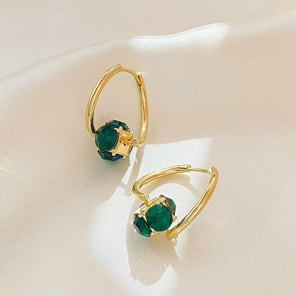 ins emerald zircon earrings French light luxury niche design rotating geometric ear buckle net red earrings trend