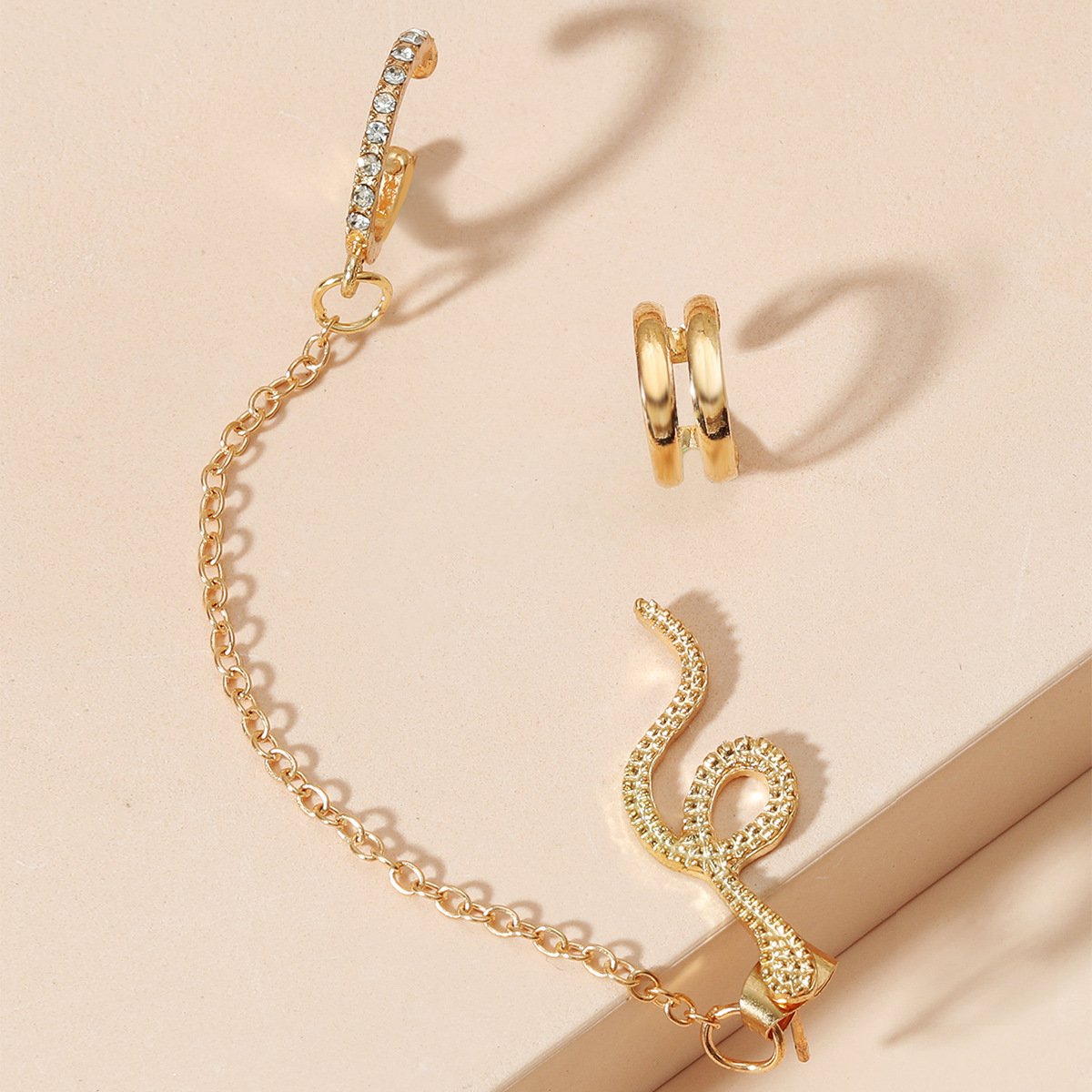Ins cold and hole-free earrings set retro zircon snake-shaped chain ear clip net red full of diamond animal earrings female