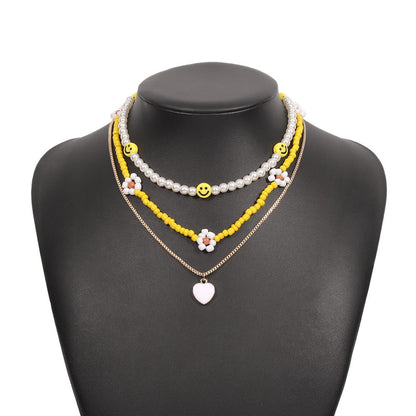 N9524 Bohemian Ethnic Necklace Rice Bead Flower Smile Face Creative Necklace Fashion Simple Necklace