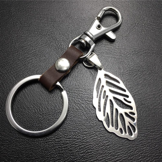 Hollow out leaves titanium steel jewelry accessories cowhide key chain 316 stainless steel men's waist hanging women's bag pendant