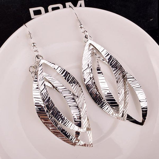 Palace Exaggerated Retro Spiral Wreath Night Star Earrings of the Same Style
