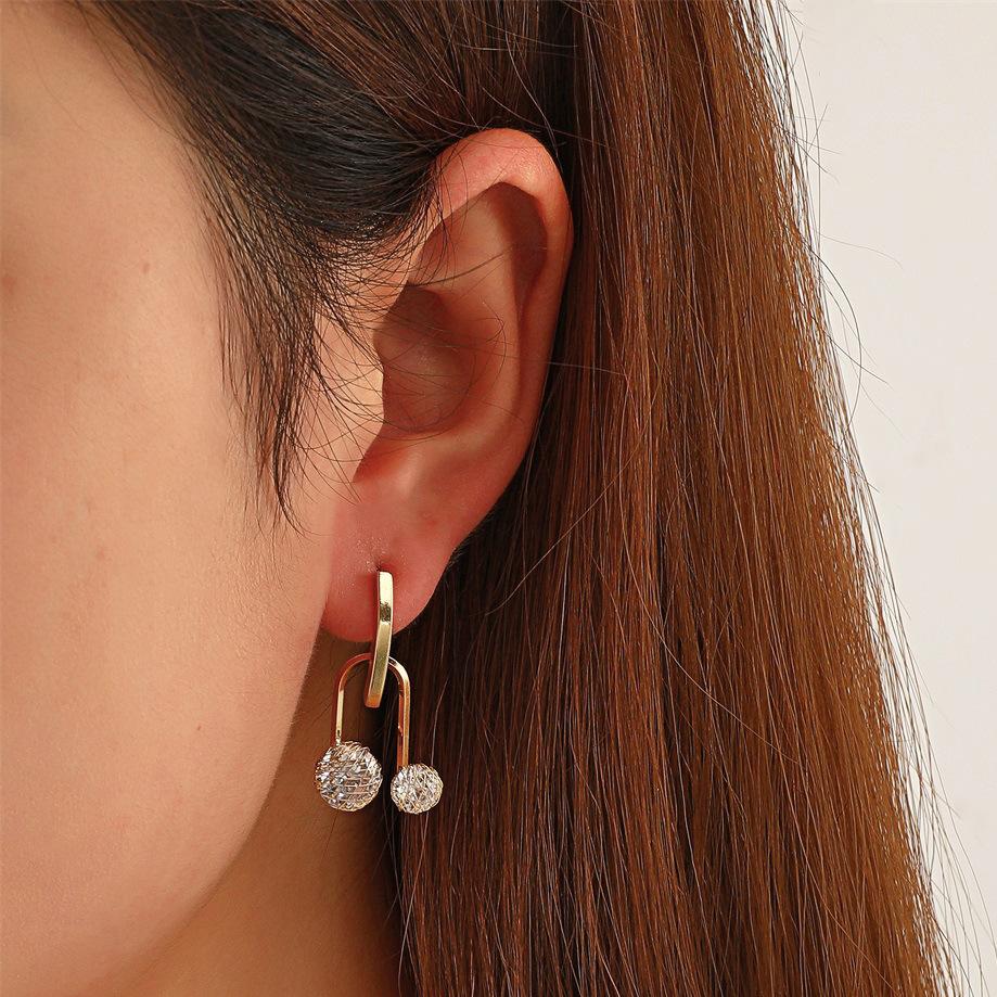 Ins copper inlaid zircon U-shaped geometric earrings French light luxury personality temperament hollow ball earrings earrings