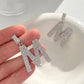 Ins full diamond letter earrings female fashion temperament niche design English letter earrings temperament earrings tide