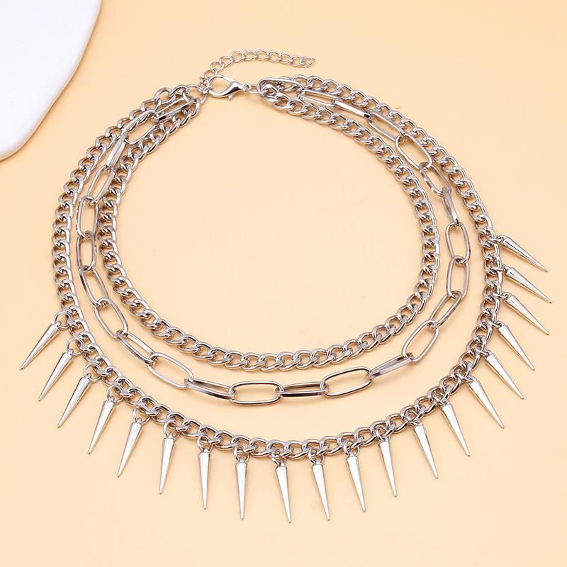 Cold and versatile titanium steel necklace men's trendy brand punk hip-hop tassel rivets light luxury clavicle chain women's pointed cone cone