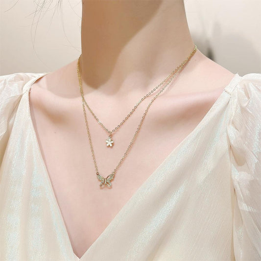 Ins stacked butterfly necklace female fashion niche design double flower pendant clavicle chain net red pendant