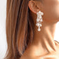 E1994 Creative hand-woven rice bead resin earrings niche design cold flower earrings