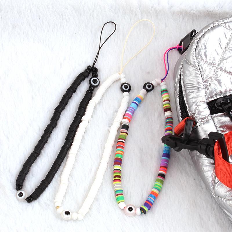 Ins personality fashion handmade color soft pottery mobile phone lanyard devil's eye decorative bag chain female