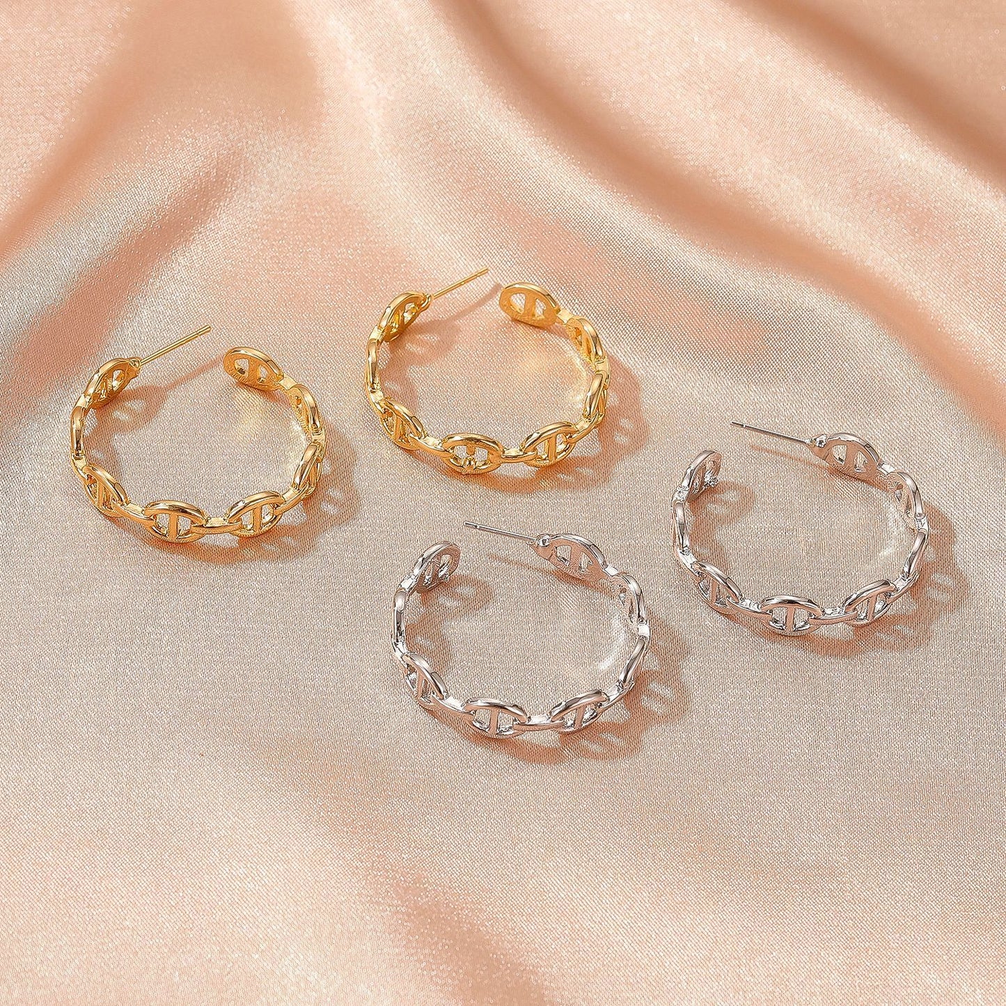 Exaggerated geometric hollow earrings cold C-shaped pig nose earrings net red trend metal earrings accessories