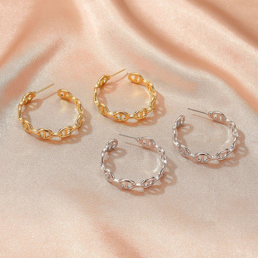 Exaggerated geometric hollow earrings cold C-shaped pig nose earrings net red trend metal earrings accessories