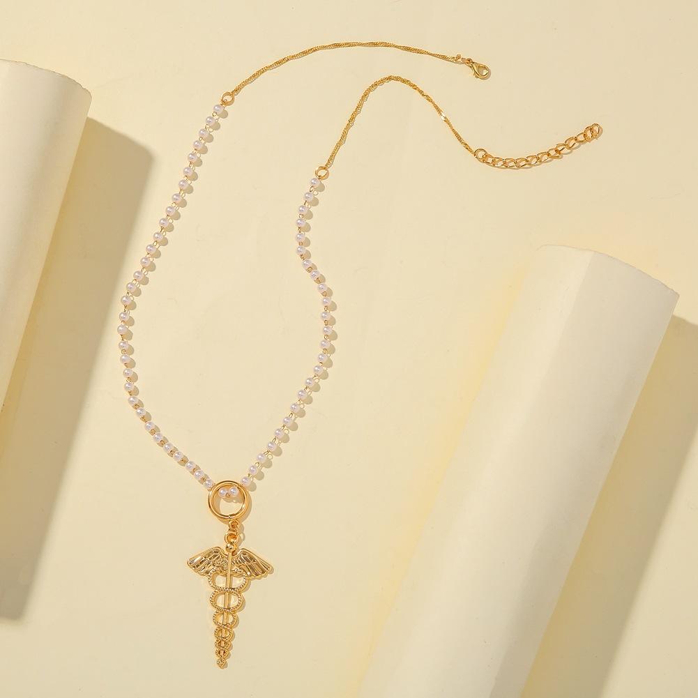 Retro Temperament French Pearl Chain Necklace Fashion Wings Wand Pendant Jewelry