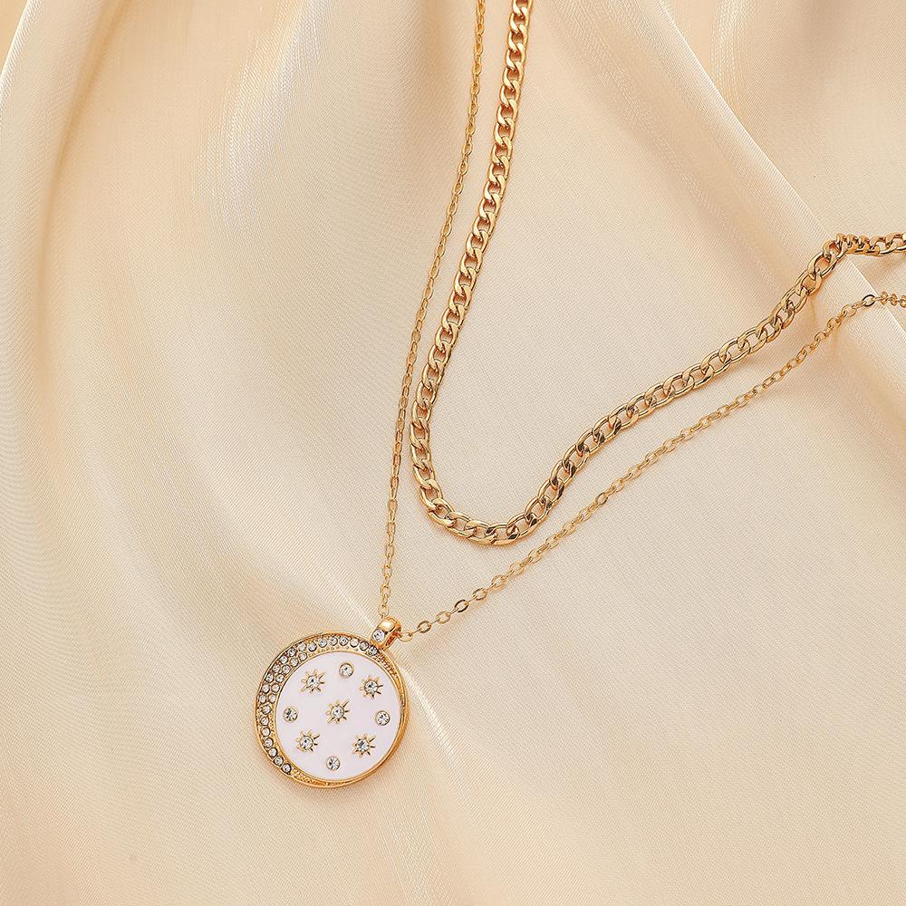 Simple personality light luxury niche metal hollow retro compass coin pendant necklace female