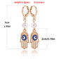 Fashion personality devil's eye palm pearl earrings women's hot style popular creative earrings