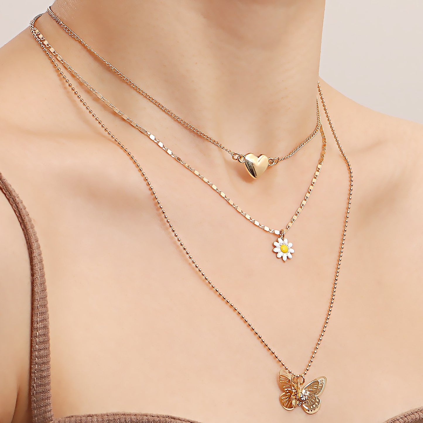 Jewelry trend multi-layer love hollow butterfly necklace female ins niche design sense light luxury