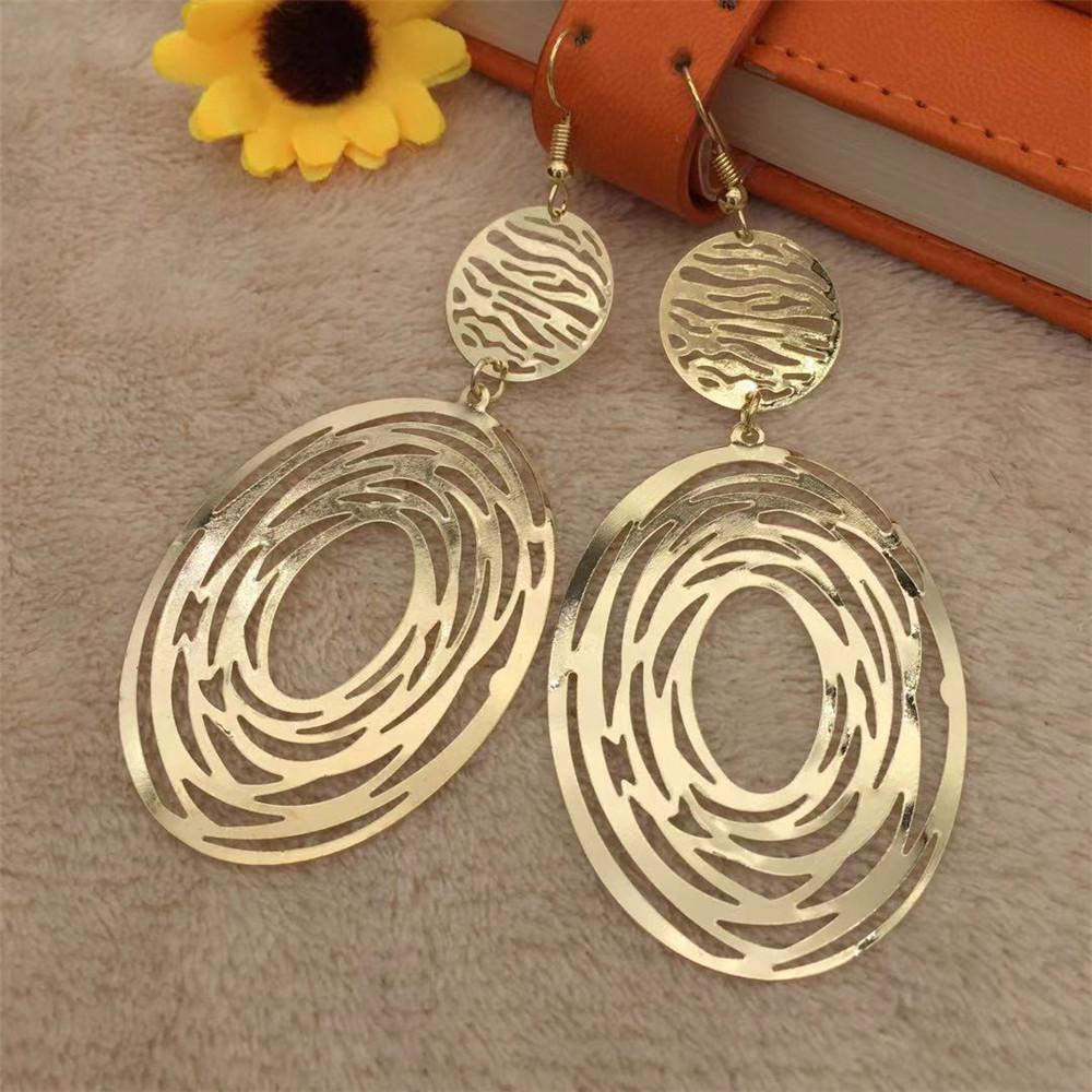 High cold night retro exaggerated earrings oval random cut hollow earrings Indian earrings