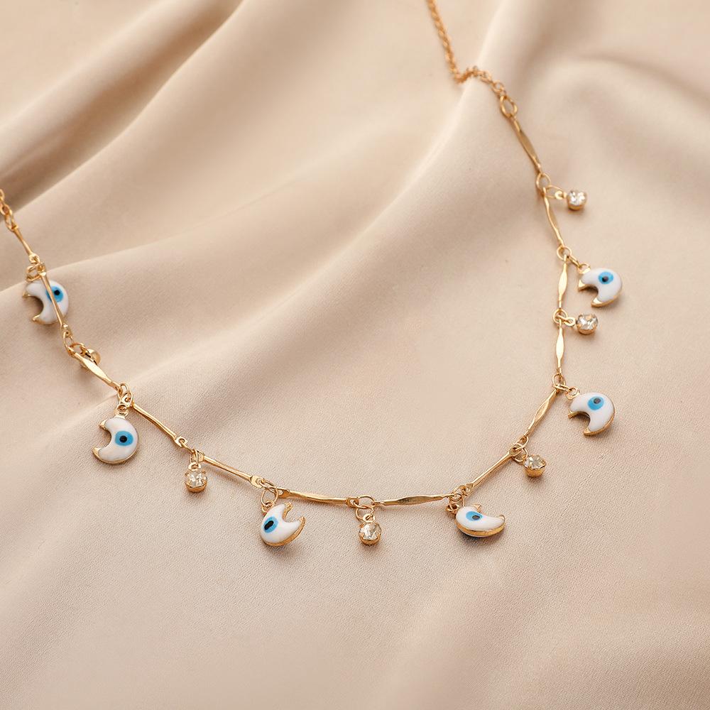Simple personality fashion moon dripping oil eyes short collarbone chain necklace versatile temperament female jewelry