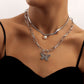 Jewelry ins fashion double bamboo snake bone chain OT buckle pearl stripe butterfly pendant necklace female