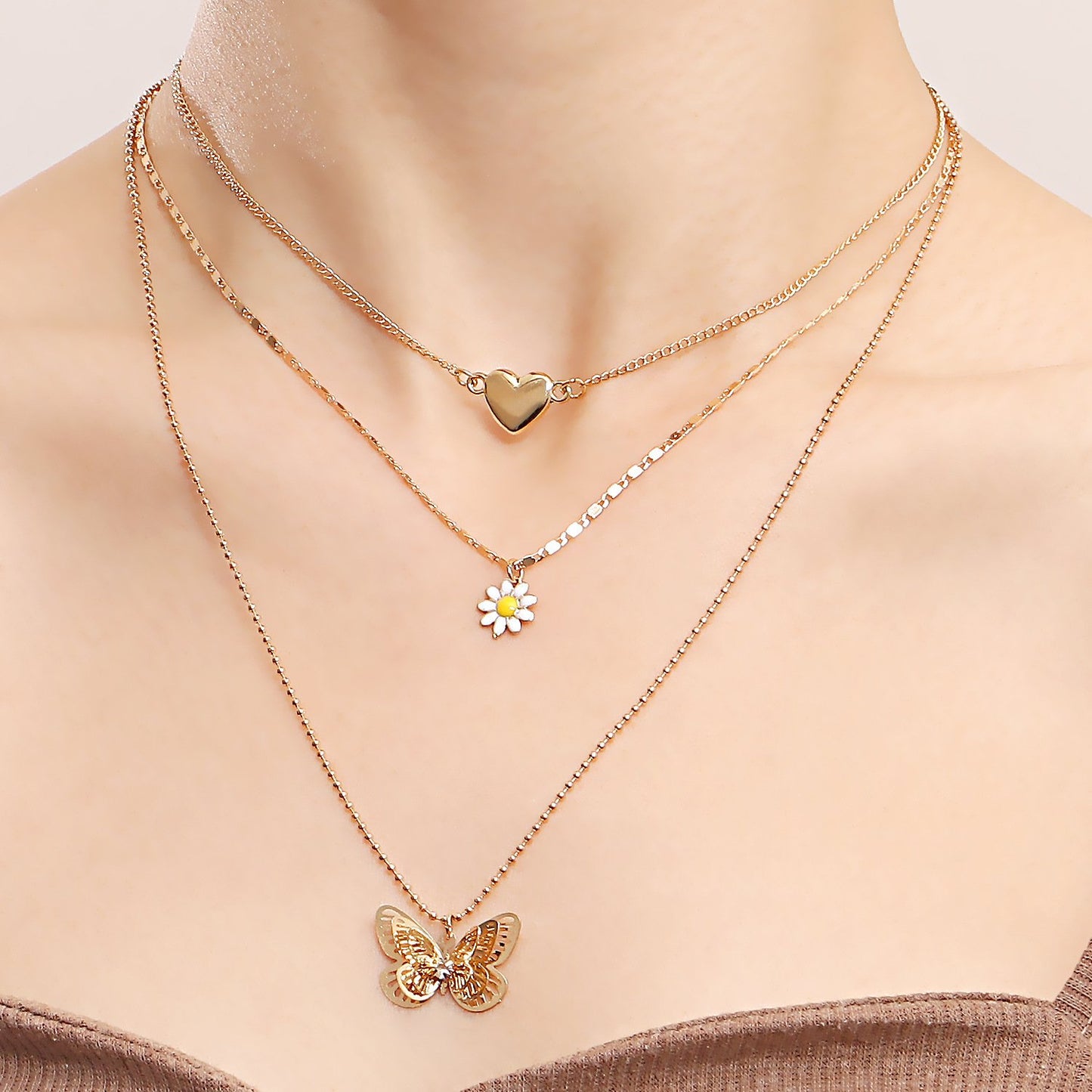 Jewelry trend multi-layer love hollow butterfly necklace female ins niche design sense light luxury