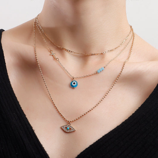 Jewelry punk multi-layer bead chain micro-set diamond blue devil's eye necklace female cross pendant