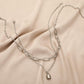 Fashionable and simple double-layer stacked stitching neutral cold stainless steel lock necklace