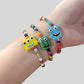 Cartoon little monster color beaded ceramic bracelet female niche design net red bracelet ins tide does not fade jewelry