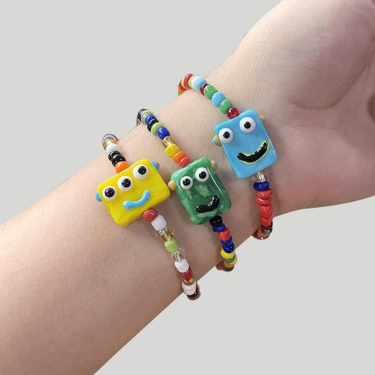 Cartoon little monster color beaded ceramic bracelet female niche design net red bracelet ins tide does not fade jewelry
