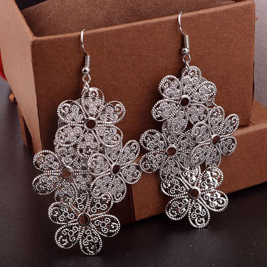 Long Hollow Plum Blossom Earrings Fashion Metal Sheet Lucky Earrings