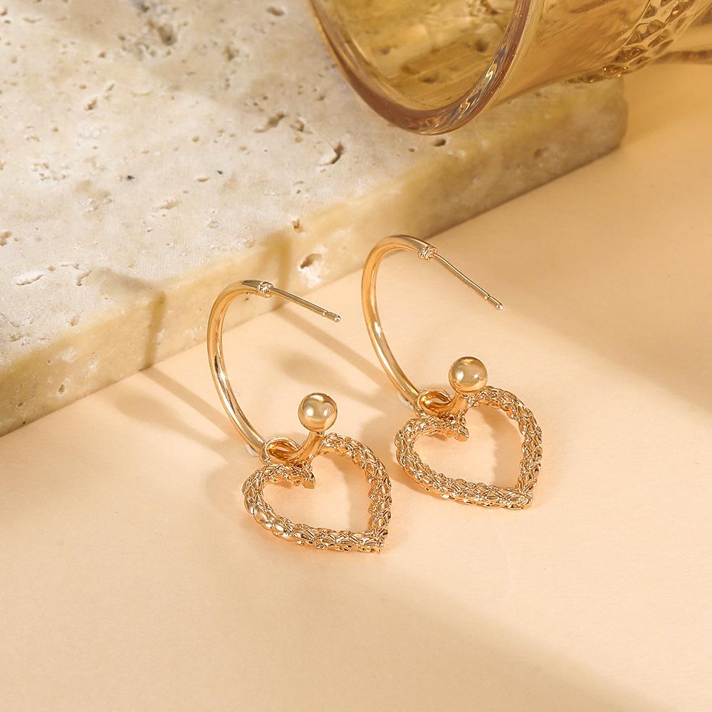 Hollow love earrings women's retro metal geometric heart-shaped earrings earhook ins net red earrings fashion