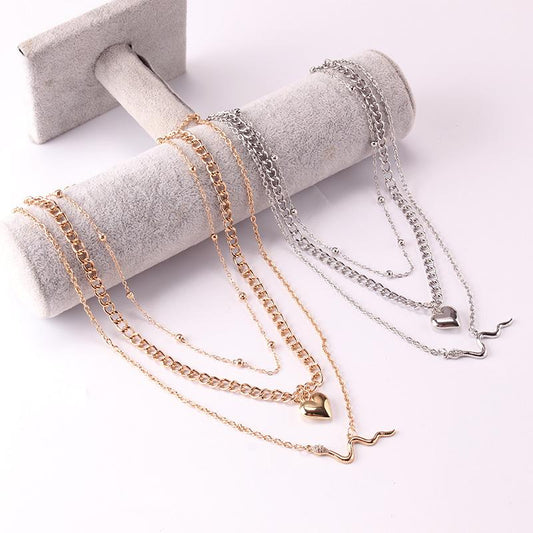 Diamond-encrusted snake pendant collarbone chain simple personality flat peach heart accessories multi-layer necklace