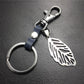 Hollow out leaves titanium steel jewelry accessories cowhide key chain 316 stainless steel men's waist hanging women's bag pendant