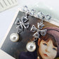 Four-leaf flower bowknot pearl and diamond earrings five-petal flower stud earrings charm
