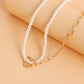 Jewelry ins creative imitation baroque pearl hollow love pendant necklace female necklace niche